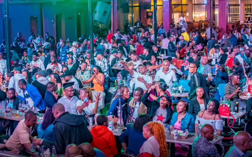 Large seated crowd at an event